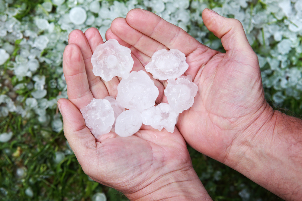 large hailstone being held in hands